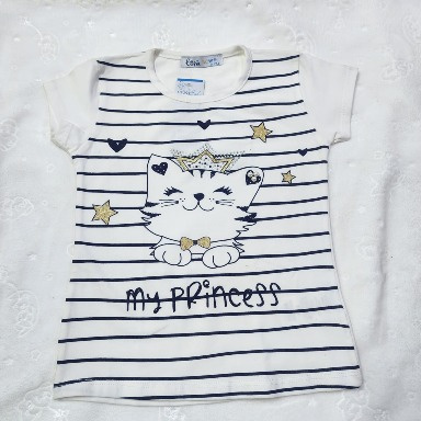 charming white and navy blue striped short-sleeve T-shirt designed for girls. It features an adorable cat graphic paired with the sweet text “My Princess,” adding a playful and cute touch. Made from soft, breathable fabric for all-day comfort, this T-shirt is perfect for casual outings, playtime, or