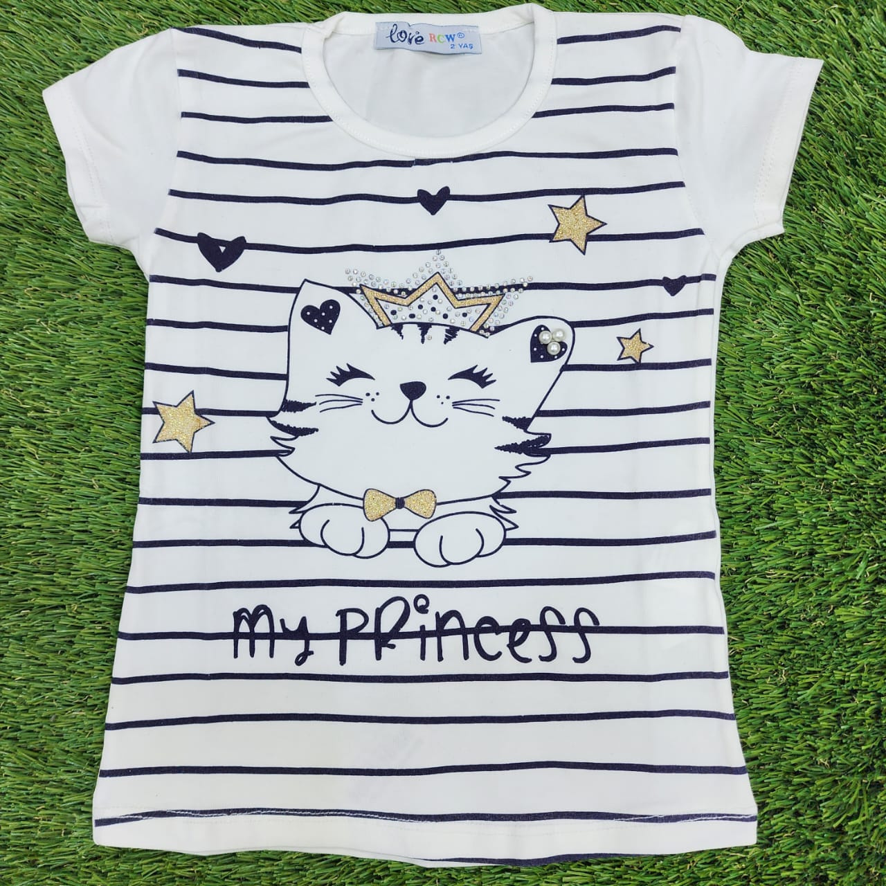 charming white and navy blue striped short-sleeve T-shirt designed for girls. It features an adorable cat graphic paired with the sweet text “My Princess,” adding a playful and cute touch. Made from soft, breathable fabric for all-day comfort, this T-shirt is perfect for casual outings, playtime, or